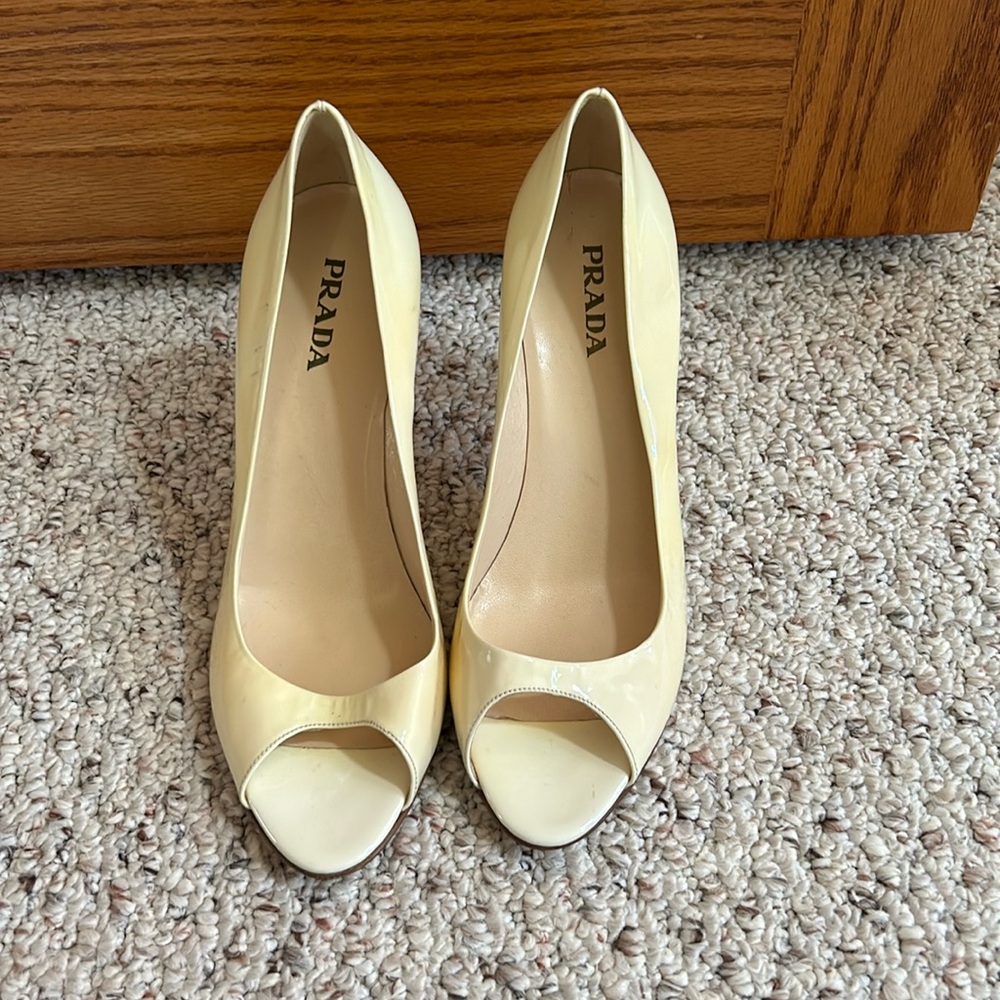 Prada cream open toed pumps. 3 inch heels.